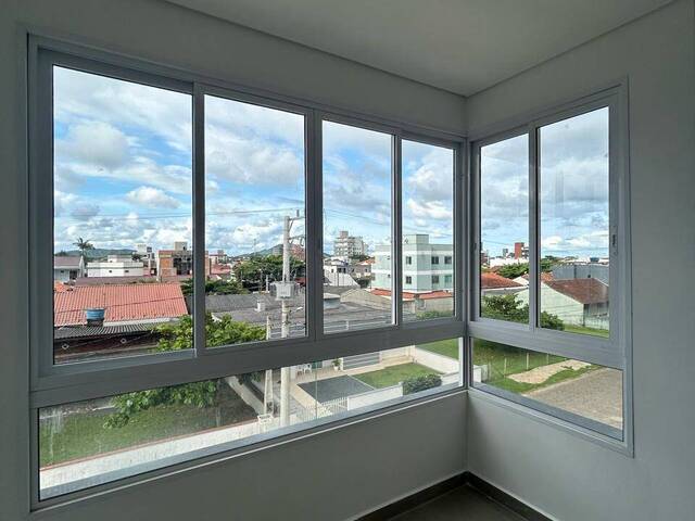 #1064 - Apartamento para Venda em Navegantes - SC